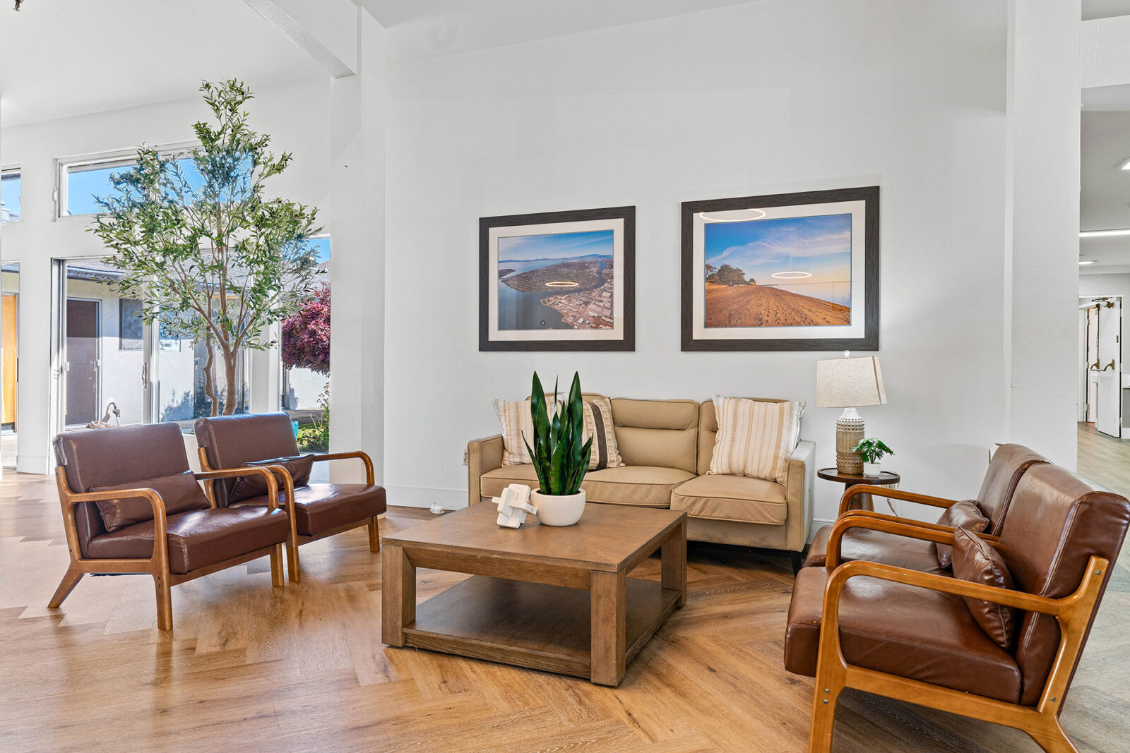 Modern living room with stylish furniture and artwork.